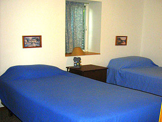 Twin beds in one bedroom